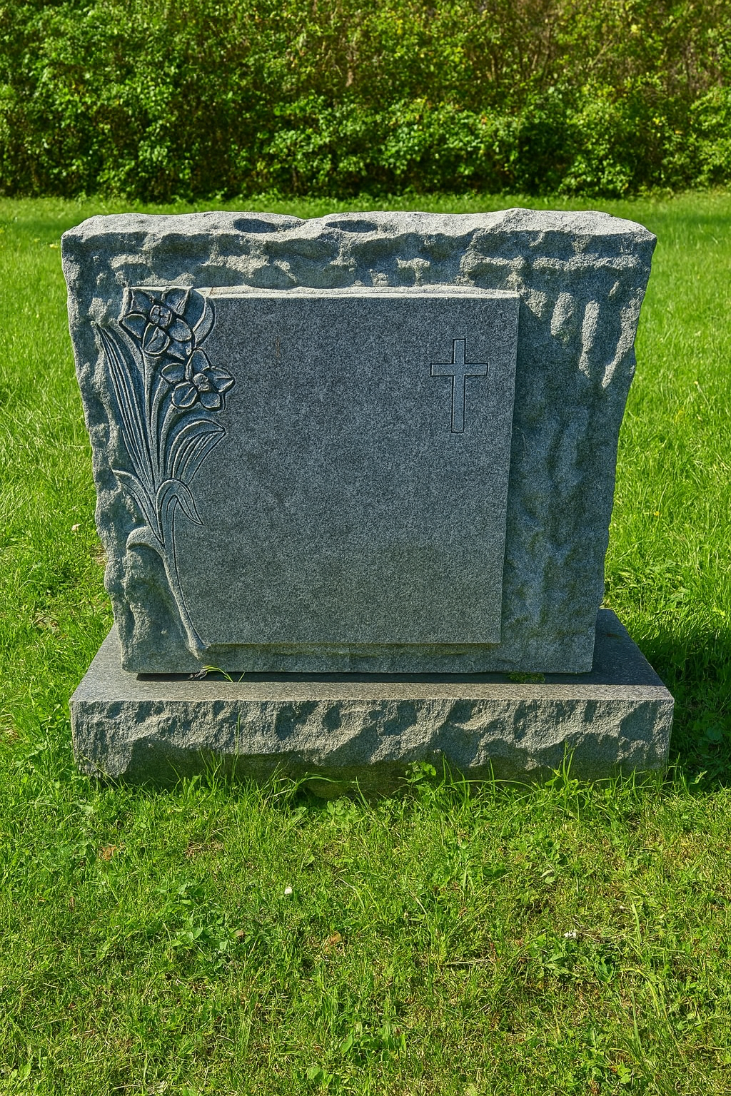 Granite Headstone with Rough Edge and Floral Cross Design